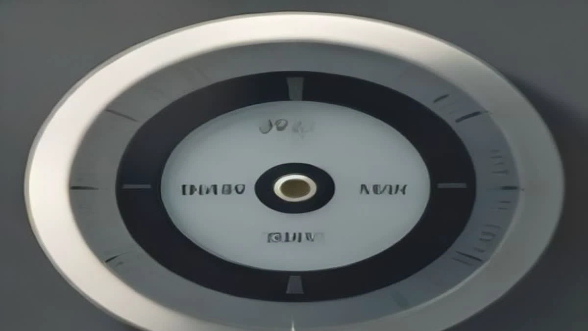 Close-up of an electricity meter dial with blurred background and late afternoon light through high windows